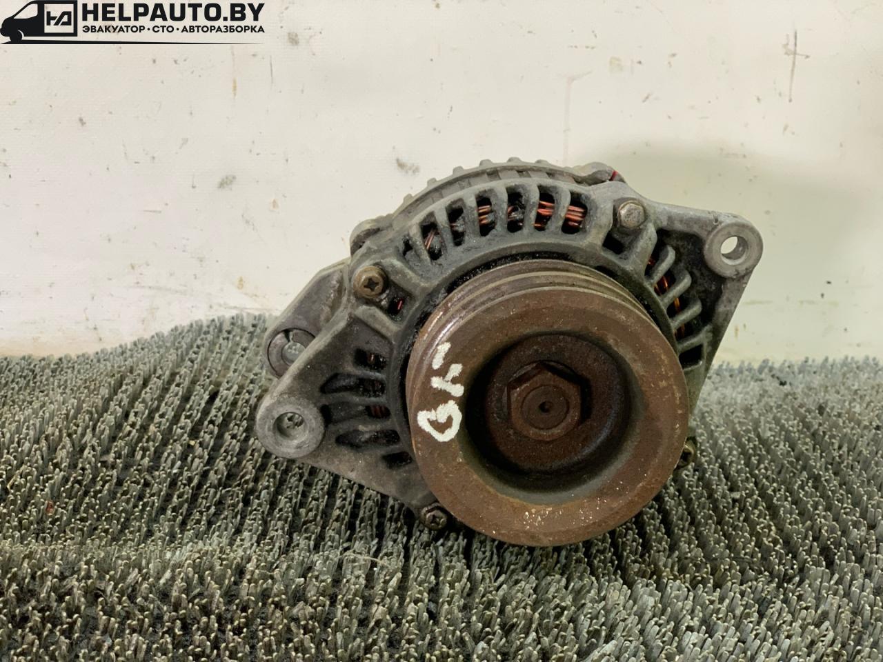 генератор Mazda 626 GF 1997, 2.0 л., дизель, МКПП, зелёный, седан, передний привод - фото №1