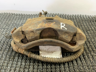 суппорт передний правый Hyundai Getz 1 поколение [рестайлинг] 2008, 1.4 л., G4EE, бензин, МКПП, золотистый, хетчбэк 5 дв.