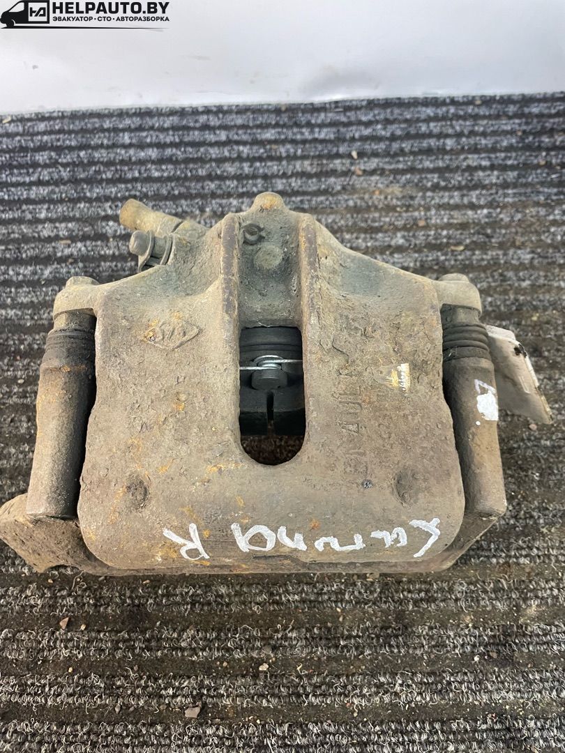 суппорт передний правый Renault Laguna 1 поколение 1996, 1.8 л., бензин, МКПП, хетчбэк 5 дв. - фото №1