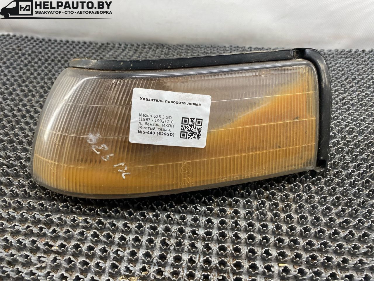 поворотник левый Mazda 626 3 поколение GD (1987 - 1992), 2.0 л., бензин, МКПП, желтый, седан, передний привод - фото №1