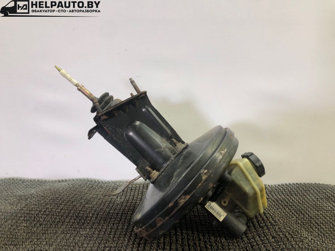 вакуумный усилитель тормозов Ford Mondeo 1 поколение 1996, 2.0 л., бензин, МКПП, серебристый, седан, передний привод - фото №1