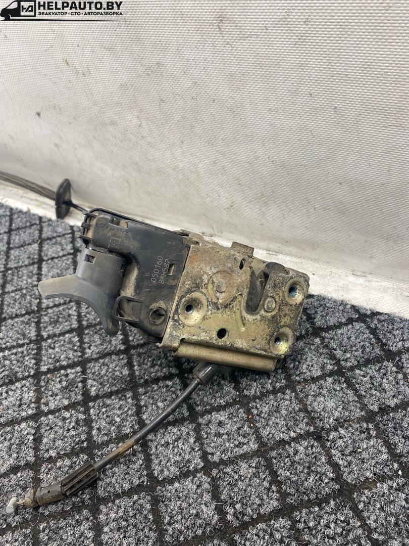 замок двери передней левой Nissan Primera P12 2002, 2.2 л., дизель, передний привод, 80970AV600 - фото №1