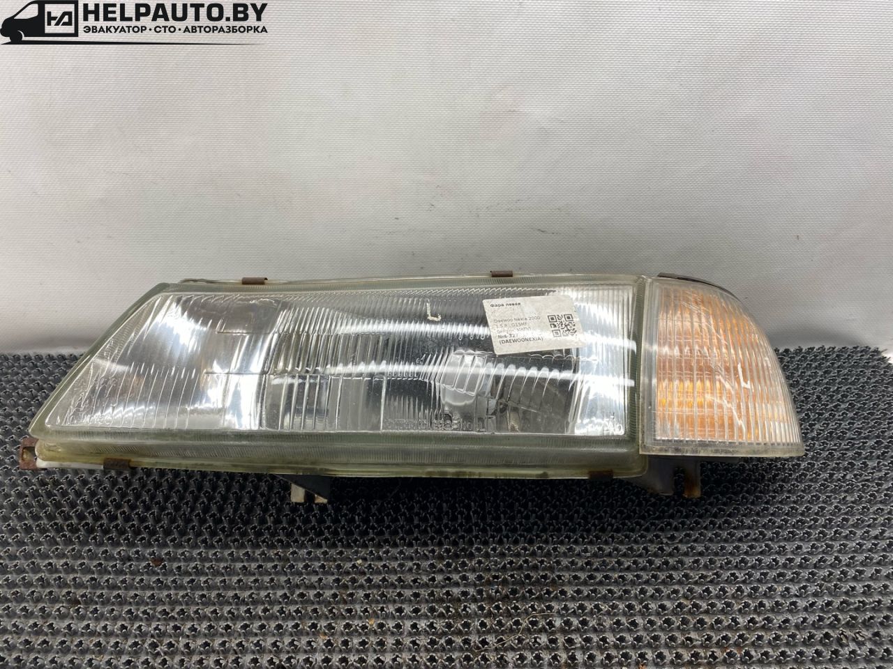 фара левая Daewoo Nexia 1 поколение 2000, 1.5 л., G15MF, бензин, МКПП, красныц, хетчбэк 5 дв., передний привод - фото №1