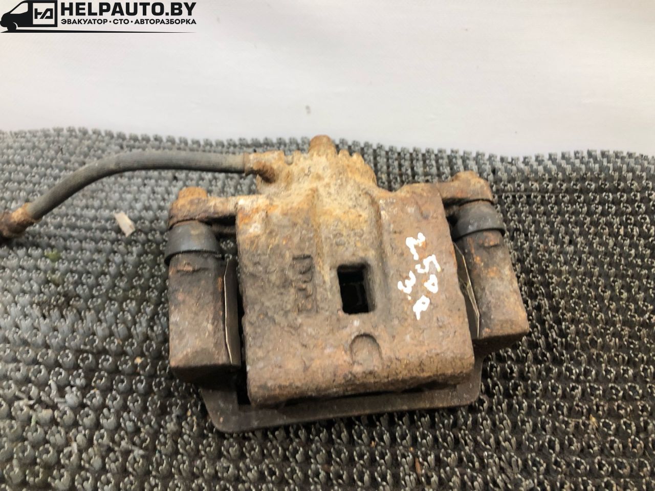 суппорт задний правый Kia Sorento 1 поколение 2005, 2.5 л., дизель, МКПП, серый, полный привод - фото №1