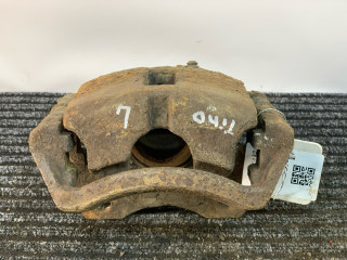 суппорт передний левый Nissan Almera Tino V10 2001, 2.2 л., YD22DDT, дизель, МКПП, берюзовый, минивэн, передний привод