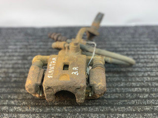 суппорт задний правый Hyundai Elantra 3 поколение [рестайлинг] XD 2005, 1.6 л., G4ED, бензин, МКПП, серебристый, седан, передний привод