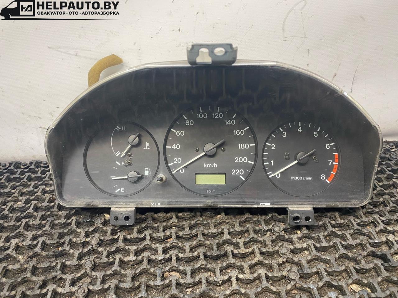 щиток приборов (приборная панель) Mazda 323 6 поколение 1998, 1.4 л., бензин, МКПП, синий, хетчбэк 3 дв., передний привод - фото №1