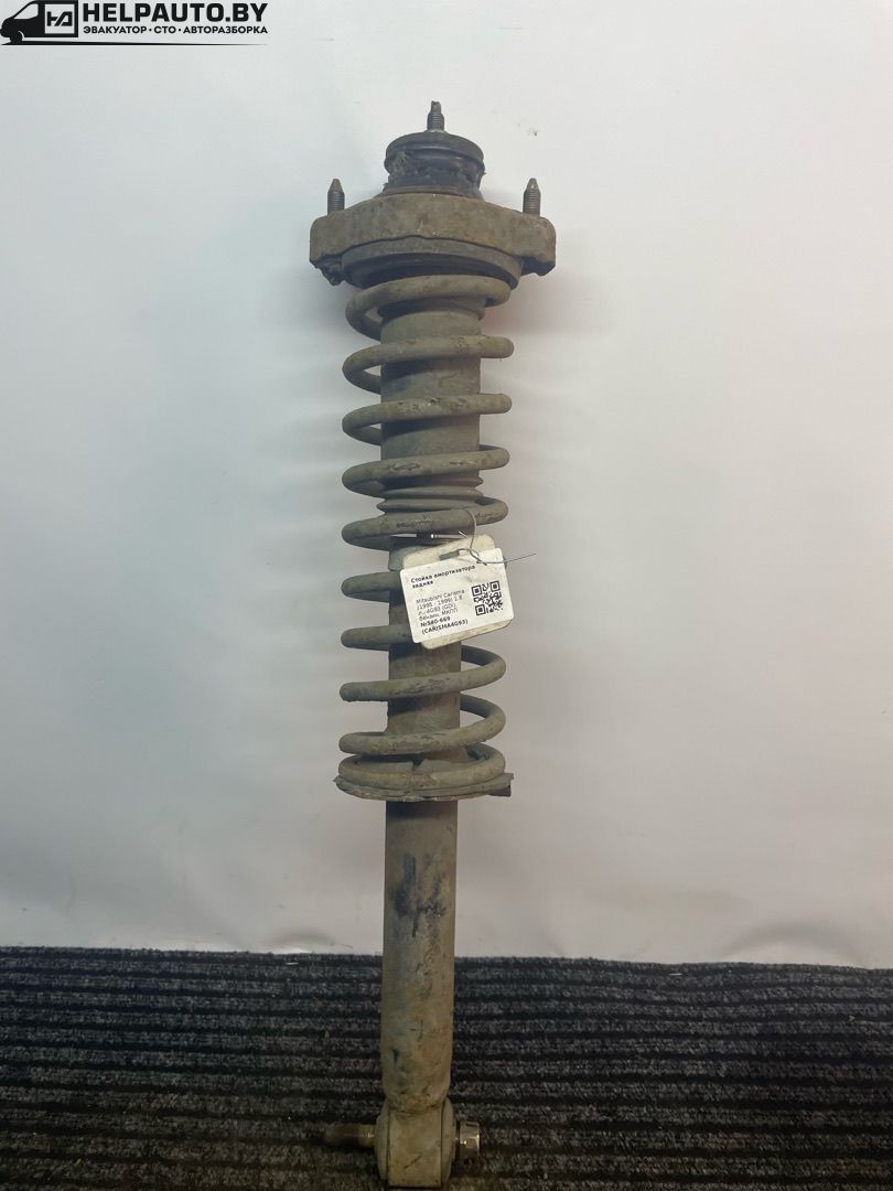 стойка задняя Mitsubishi Carisma 1 поколение (1995 - 1999), 1.8 л., 4G93 (GDI), бензин, МКПП, серебро, хетчбэк 5 дв., передний привод - фото №1