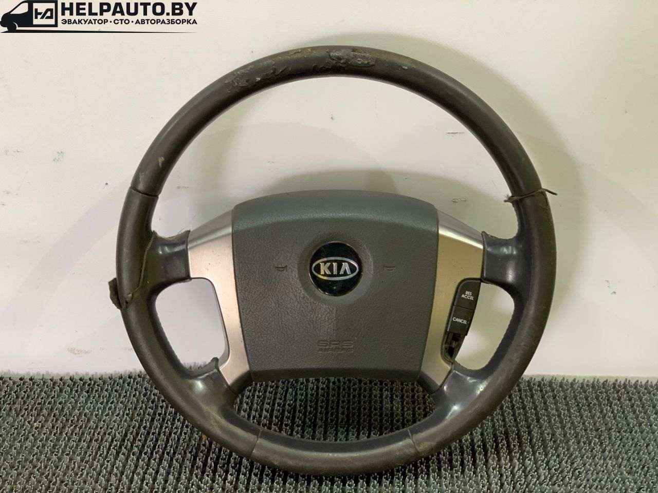 руль Kia Sorento 1 поколение 2005, 2.5 л., CRDi, D4CB, дизель, МКПП, черный, внедорожник 5 дв., полный подключаемый привод - фото №1