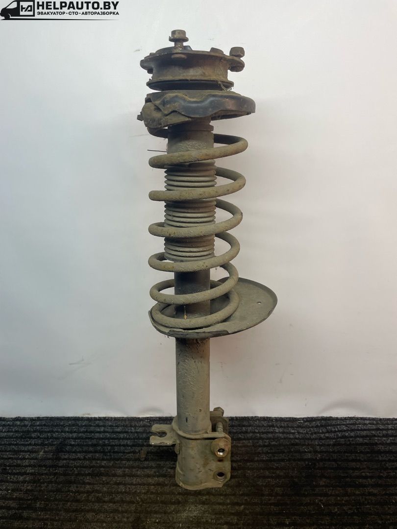 стойка задняя Mazda 626 3 поколение 1990, 2.0 л., F8 (12V), бензин, 5МКПП, серебристый, седан, передний привод - фото №1