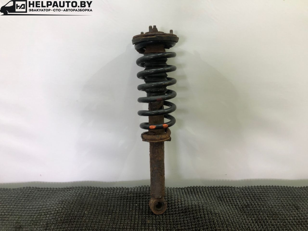 стойка передняя правая Kia Sorento 1 поколение 2005, 2.4 л., G4JS, бензин, МКПП, красный, внедорожник 5 дв., полный подключаемый привод - фото №1