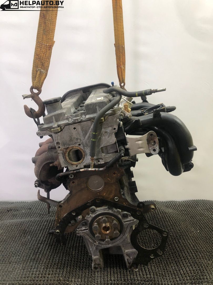 двигатель Ford Mondeo 1 поколение 1996, 2.0 л., бензин, МКПП, серебристый, седан, передний привод, SL25485, NGA - фото №1