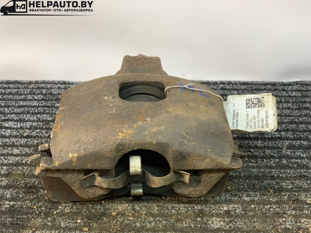 суппорт передний левый Chrysler Voyager 3 поколение 1997, 2.4 л., EDZ, бензин, АКПП, зеленый, минивэн, передний привод - фото №1