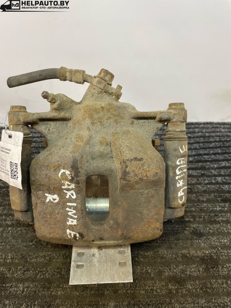 суппорт передний правый Toyota Carina E 1 поколение 1995, 2.0 л., 2C, дизель, МКПП, бордовый, хетчбэк 5 дв., передний привод - фото №1