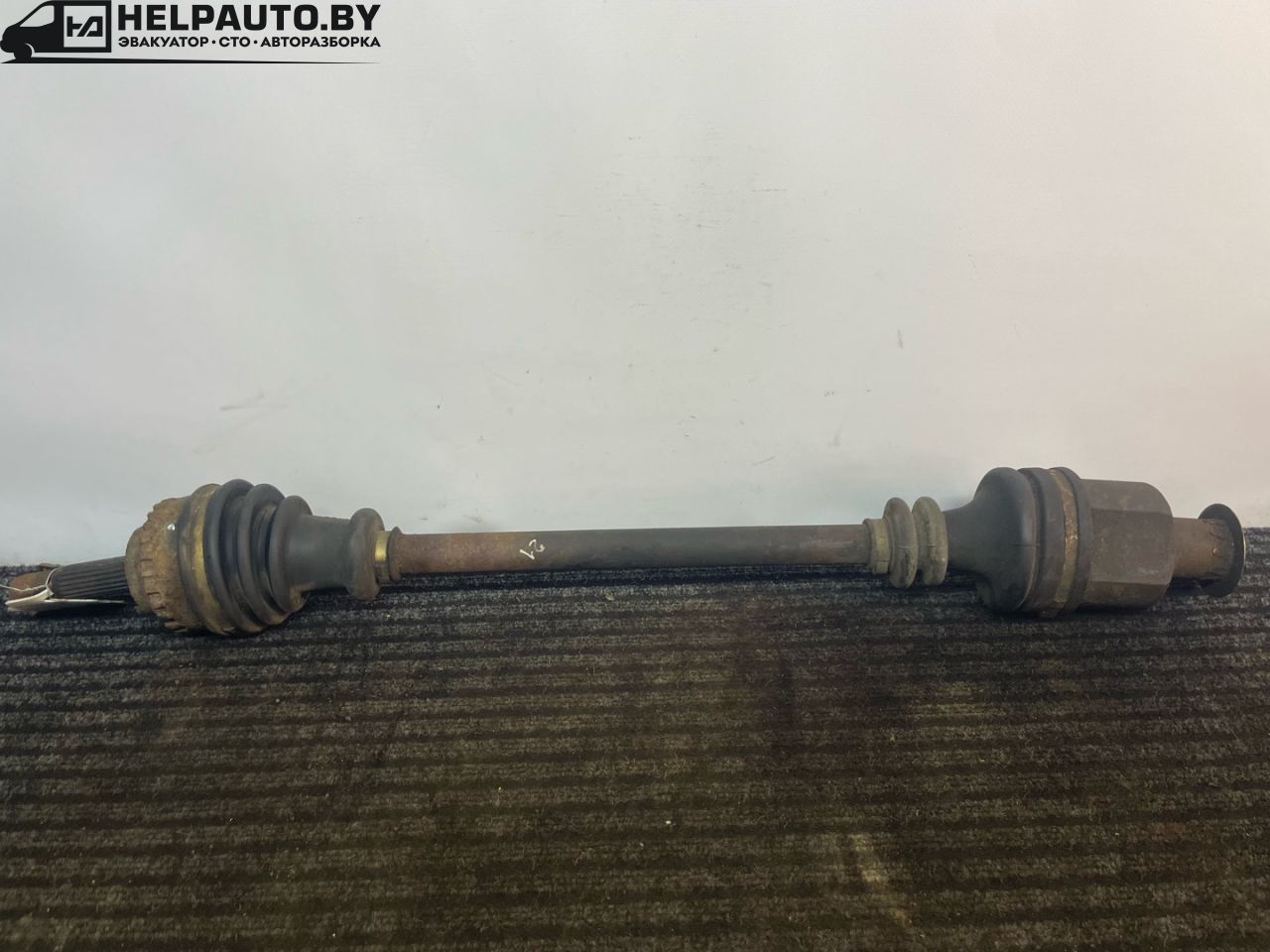 полуось передняя правая (приводной вал, ШРУС) Renault Clio 2 поколение 2000, 1.4 л., бензин, МКПП, серебро, хетчбэк 3 дв., передний привод - фото №1