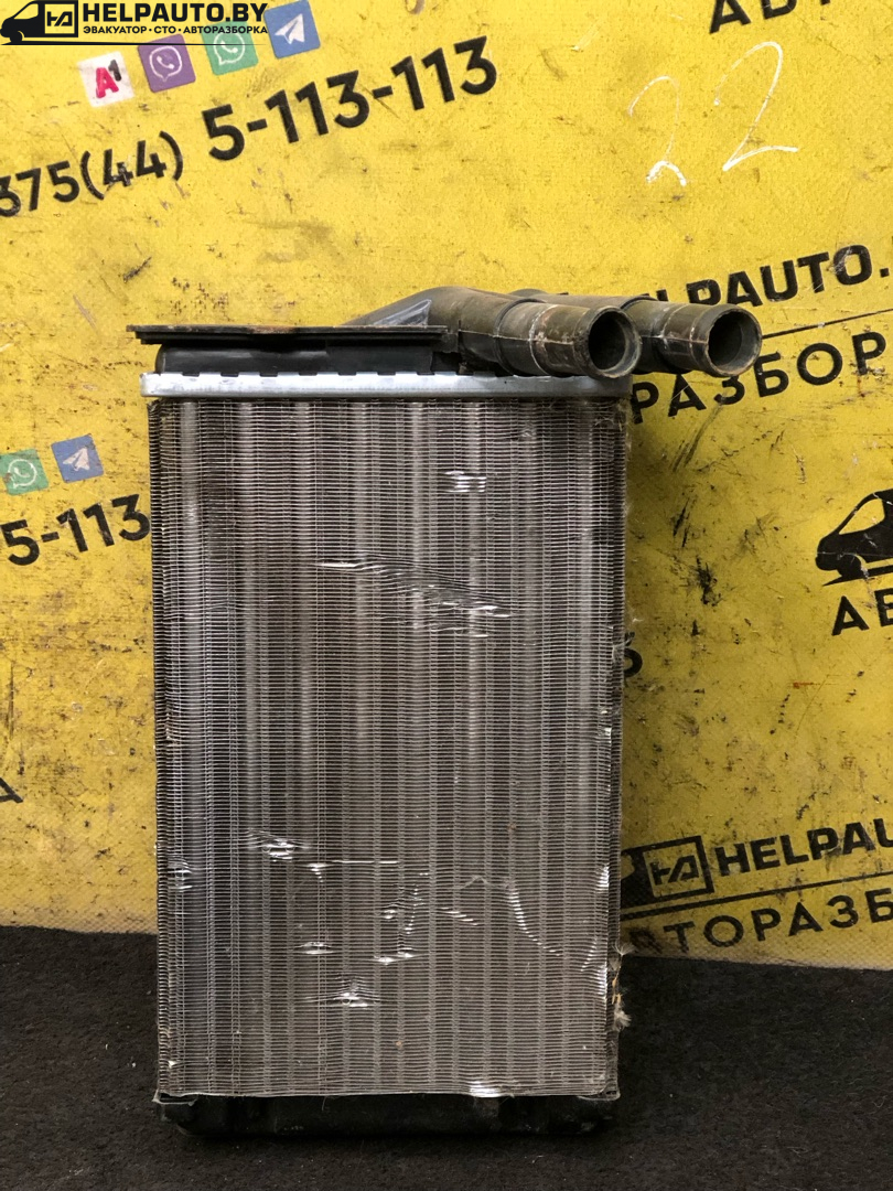 радиатор отопителя (печки) Volkswagen Passat B3 1988, 1.8 л., бензин, МКПП, белый, седан, передний привод - фото №1