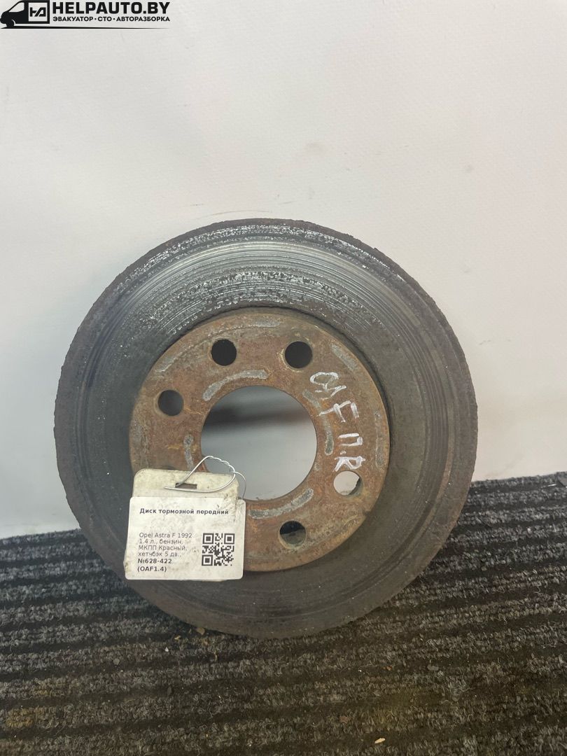 диск тормозной передний Opel Astra F 1992, 1.4 л., C 14 NZ, бензин, МКПП, красный, хетчбэк 5 дв., передний привод - фото №1