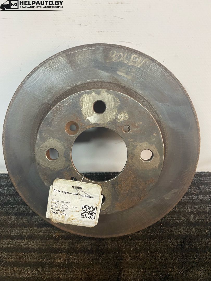 диск тормозной передний Suzuki Baleno 1 поколение (1995 - 2002), 1.6 л., G16B, бензин, МКПП, серебристый, универсал, передний привод - фото №1