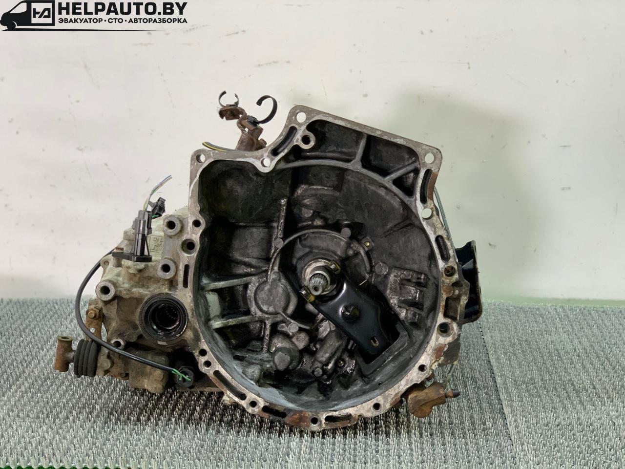 КПП механическая (МКПП) Mazda 323 6 поколение 1998, 1.4 л., бензин, МКПП, синий, хетчбэк 3 дв., передний привод, F5D2 - фото №1