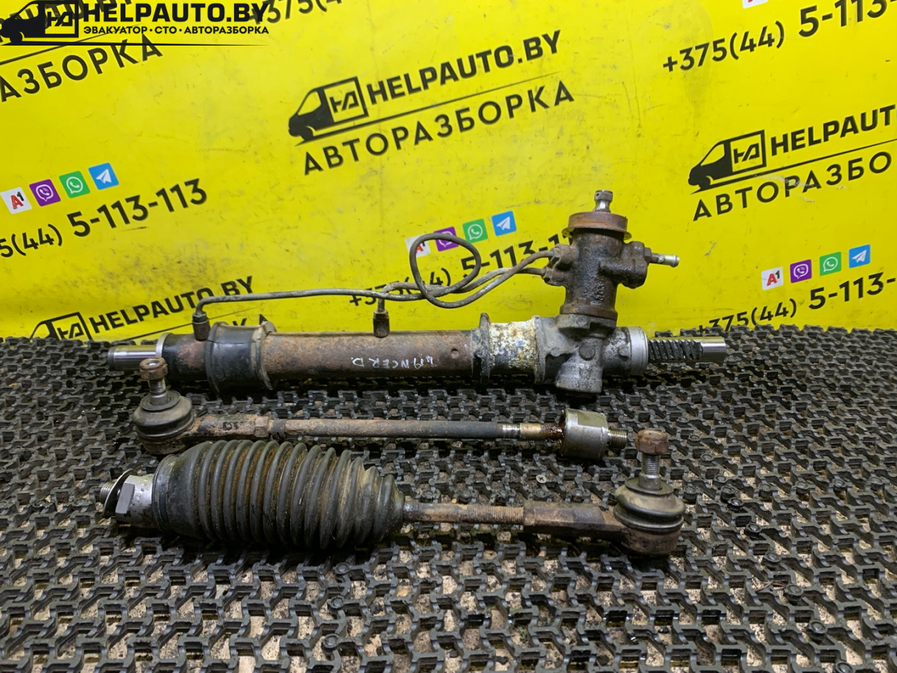 рулевая рейка Mitsubishi Lancer 7 поколение 1996, 2.0 л., дизель, МКПП, белый, универсал, передний привод - фото №1