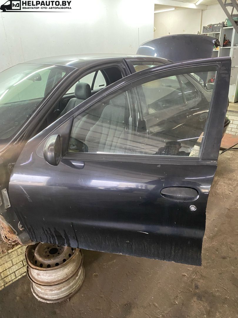 замок двери передней левой Pontiac Sunfire 1 поколение 1999, 2.2 л., бензин, АКПП, черный, передний привод - фото №1