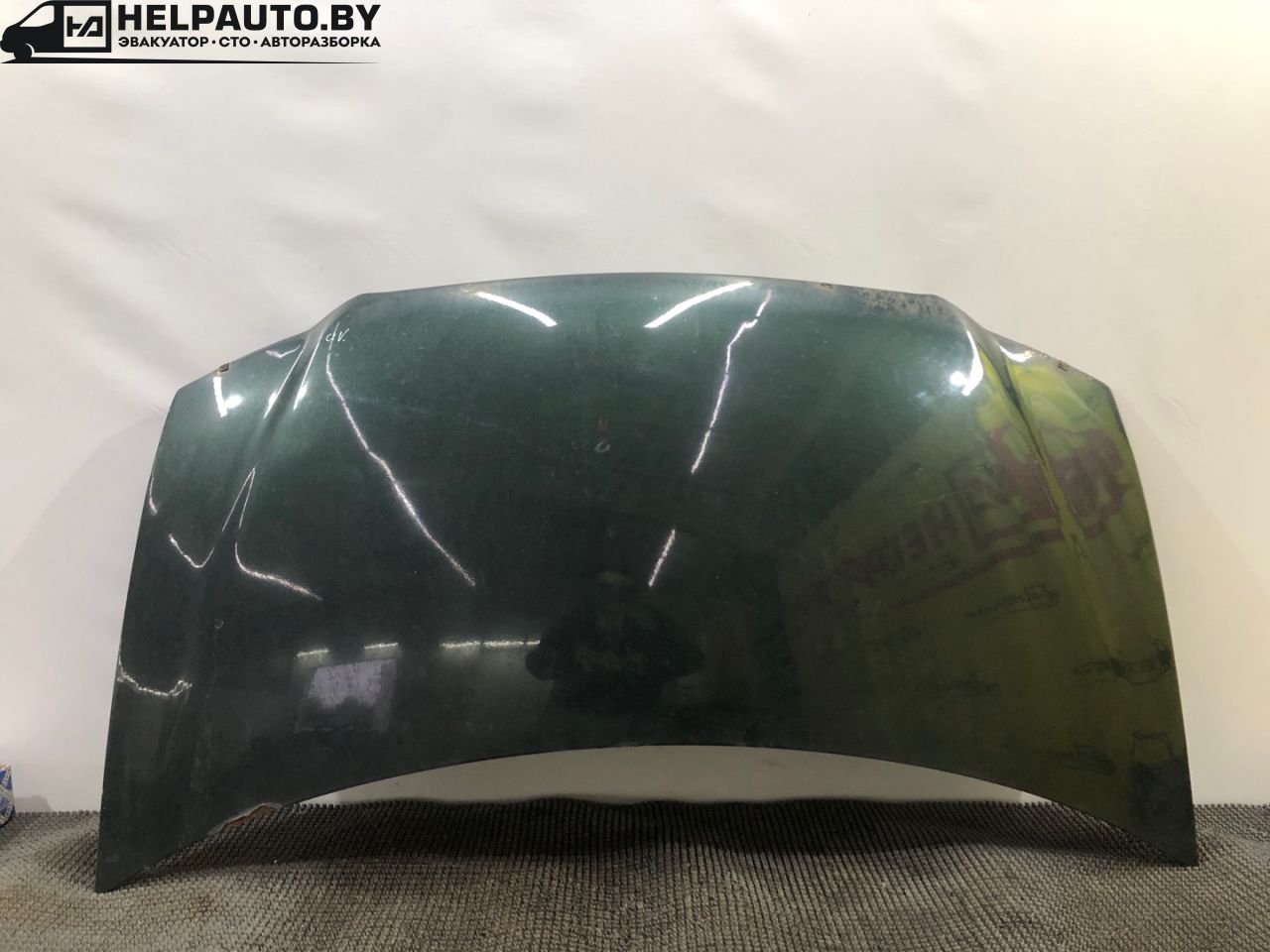 капот Dodge Caravan 3 поколение RG 1999, 2.4 л., EDZ, бензин, АКПП, темно зеленый, передний привод - фото №1