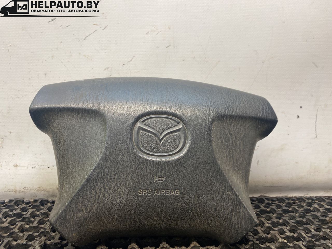 подушка безопасности водителя Mazda 626 GF 1997, 2.0 л., дизель, МКПП, зелёный, седан, передний привод - фото №1
