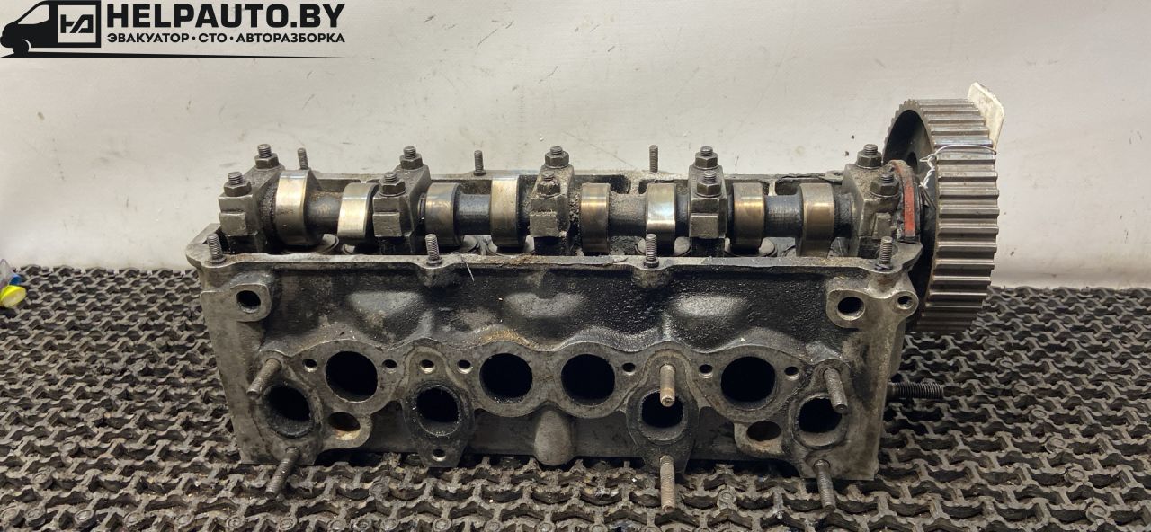 головка блока цилиндров Volkswagen Golf 2 поколение 1990, 1.6 л., дизель, МКПП, черный, хетчбэк 3 дв., передний привод - фото №1