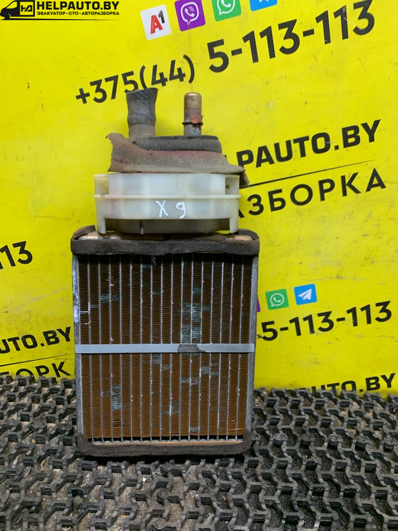 радиатор отопителя (печки) Mazda Xedos 9 1 поколение 1996, 2.5 л., бензин, МКПП, темно синий, седан, передний привод - фото №1