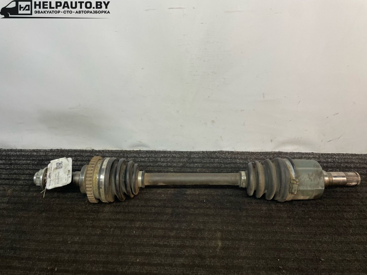 полуось передняя левая (приводной вал, ШРУС) Kia Shuma 1 поколение 1999, 1.5 л., BFD, бензин, МКПП, зеленый, хетчбэк 5 дв., передний привод - фото №1