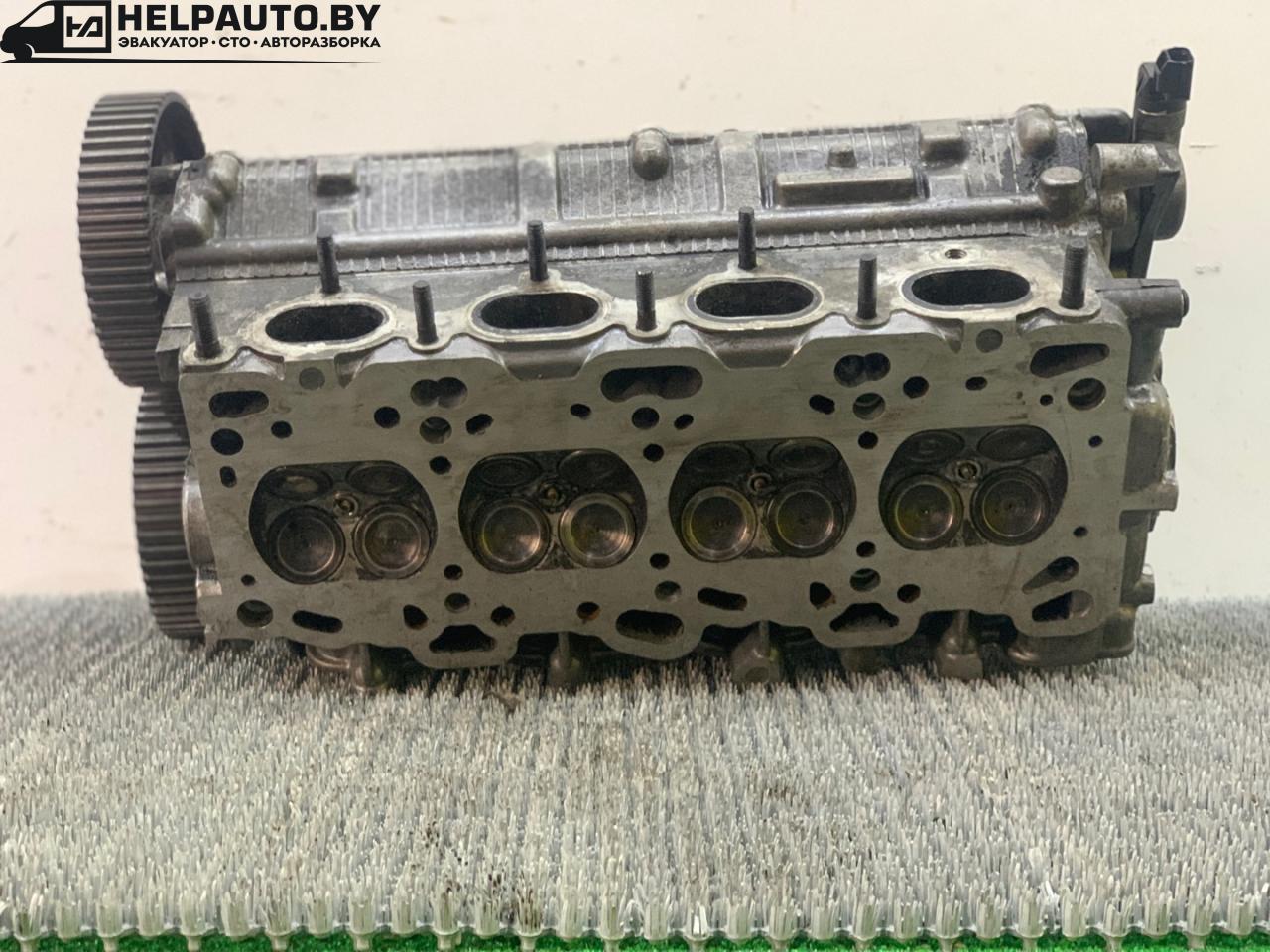 головка блока цилиндров Kia Sorento 1 поколение 2005, 2.4 л., G4JS, бензин, МКПП, красный, внедорожник 5 дв., полный подключаемый привод - фото №1