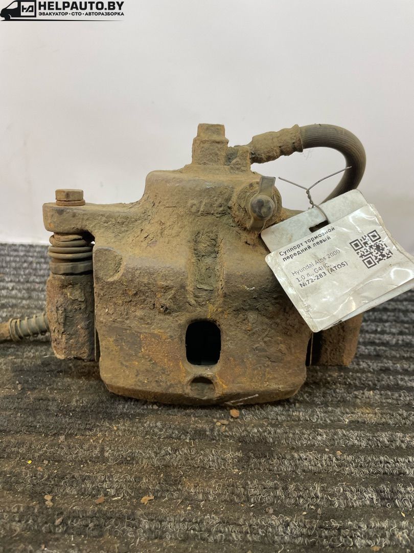 суппорт передний левый Hyundai Atos 1 поколение 2000, 1.0 л., G4HC, бензин, МКПП, черный, хетчбэк 5 дв. - фото №1