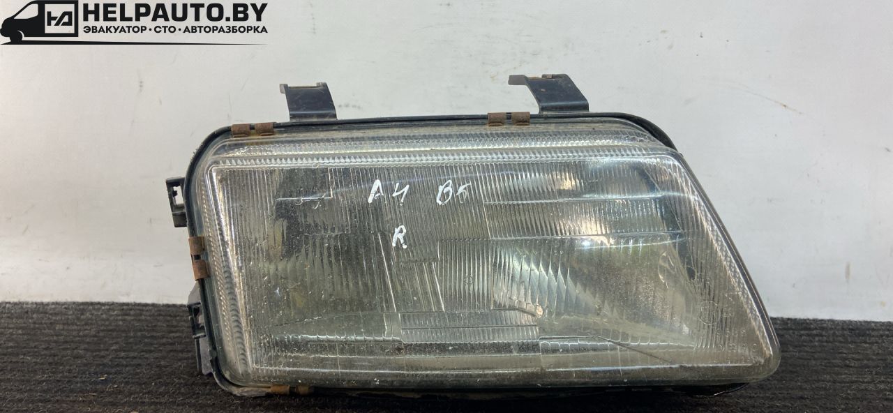 фара правая Audi A4 B5 1999, 1.8 л., бензин, АКПП, черный, универсал, передний привод - фото №1