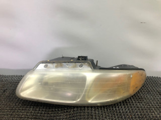фара левая Dodge Caravan 3 поколение RG 1999, 2.4 л., EDZ, бензин, АКПП, темно зеленый, передний привод