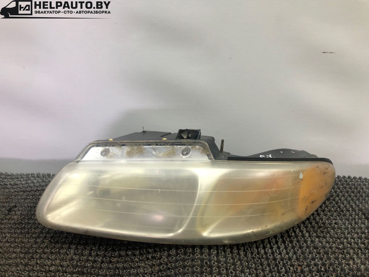 фара левая Dodge Caravan 3 поколение RG 1999, 2.4 л., EDZ, бензин, АКПП, темно зеленый, передний привод - фото №1