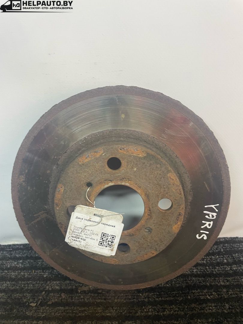 диск тормозной передний Toyota Yaris P1 2001, 1.0 л., 1SZ-FE, бензин, МКПП, серебро, хетчбэк 5 дв., передний привод - фото №1