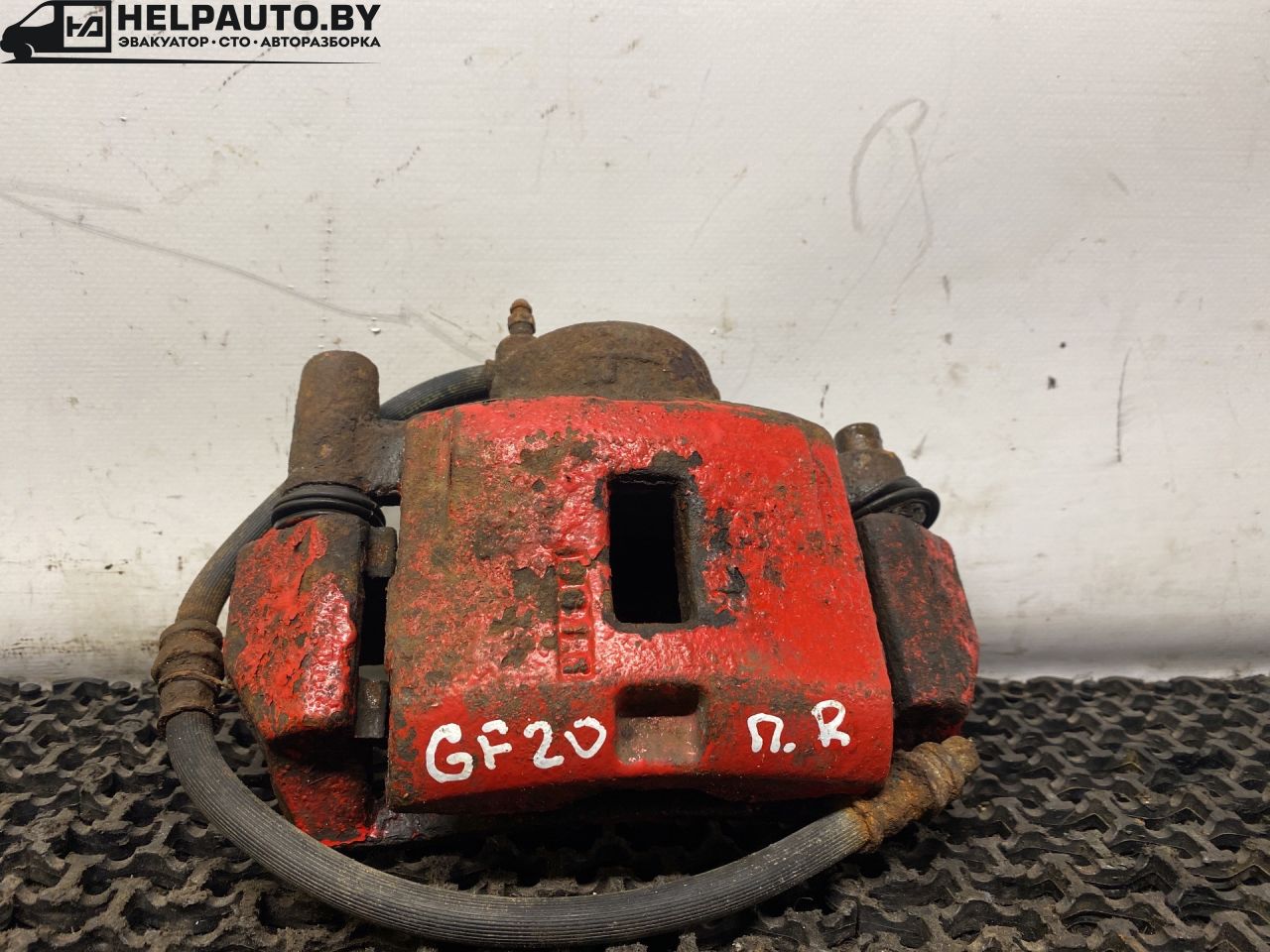 суппорт передний правый Mazda 626 GF 1997, 2.0 л., дизель, МКПП, зелёный, седан, передний привод - фото №1