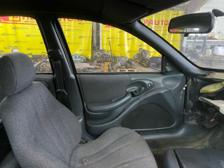 дверь передняя левая Pontiac Sunfire 1 поколение 1999, 2.2 л., бензин, АКПП, черный, передний привод
