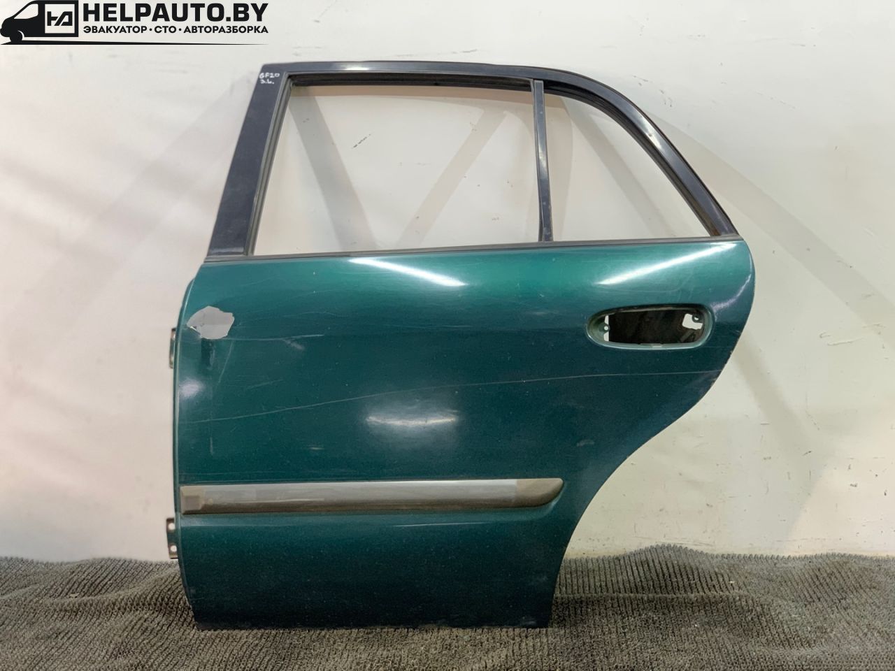 дверь задняя левая Mazda 626 GF 1997, 2.0 л., дизель, МКПП, зелёный, седан, передний привод - фото №1