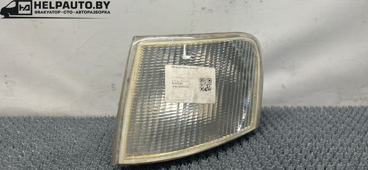 поворотник левый Ford Escort 5 поколение 1992, 1.6 л., бензин, МКПП, красный, хетчбэк 5 дв. - фото №1