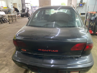 крышка багажника (дверь 3-5) Pontiac Sunfire 1 поколение 1999, 2.2 л., бензин, АКПП, черный, передний привод