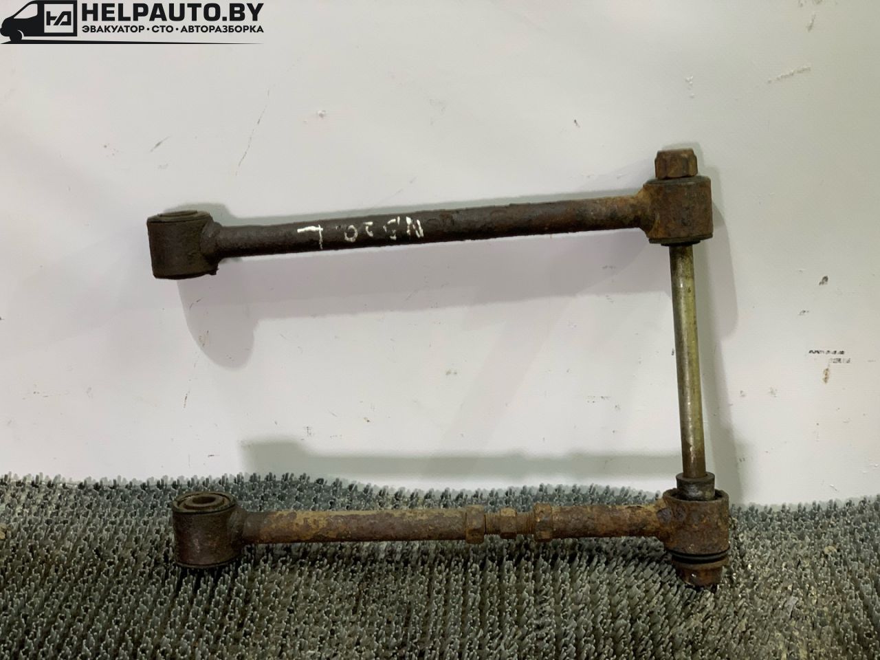 рычаг задний левый Nissan Bluebird T12/T72 1987, 2.0 л., бензин, МКПП, бордовый, хетчбэк 5 дв., передний привод - фото №1