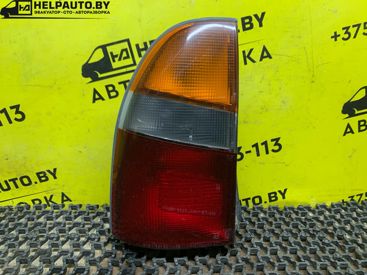 фонарь задний левый Mitsubishi Lancer 7 поколение 1996, 2.0 л., дизель, МКПП, белый, универсал, передний привод - фото №1
