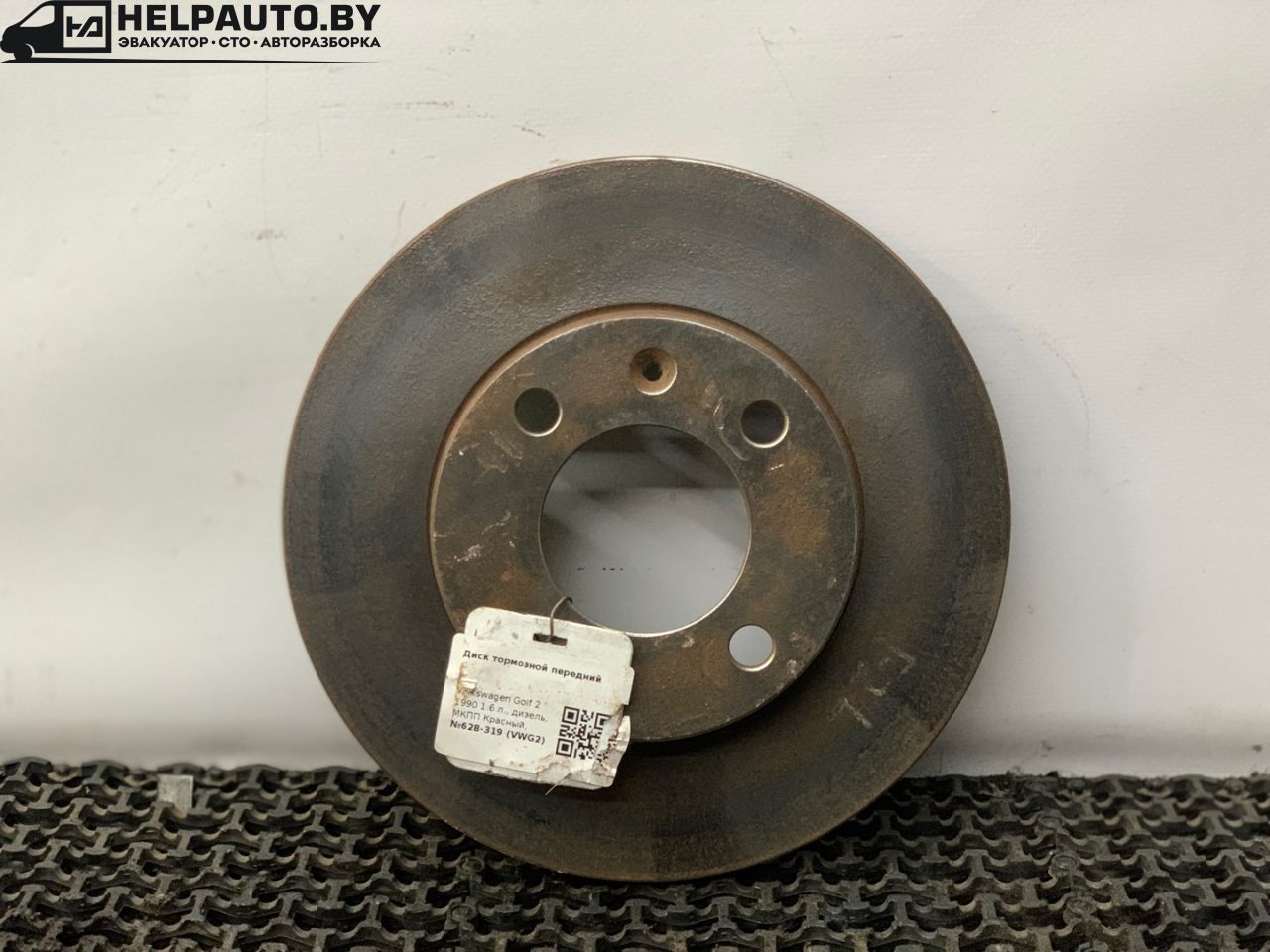 диск тормозной передний Volkswagen Golf 2 поколение 1990, 1.6 л., дизель, МКПП, красный, хетчбэк 5 дв., передний привод - фото №1