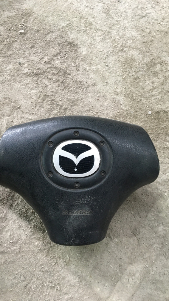 Подушка безопасности водителя к Mazda 323, 2001, купить | DT-20582. Фото #1