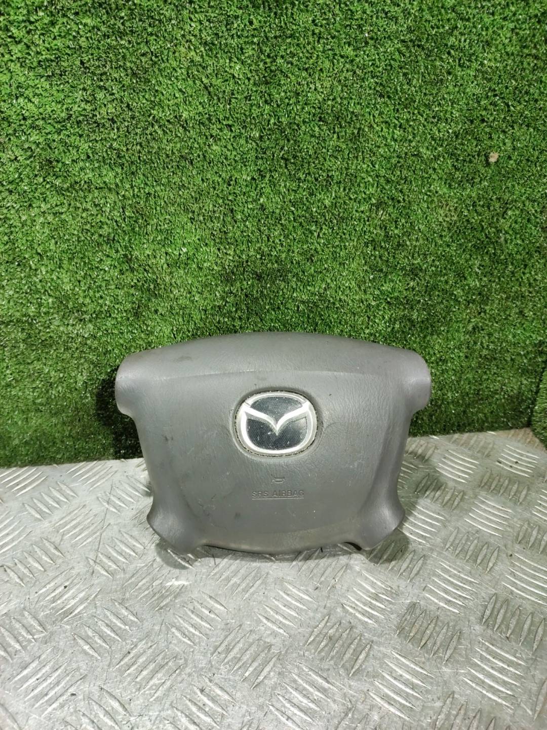 Подушка безопасности (Airbag) водителя - Mazda 323 BJ (1998-2003)