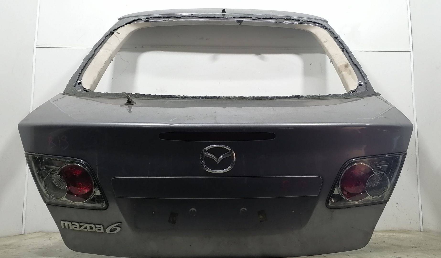 Фонарь крышки багажника левый Mazda 6 GG купить в России