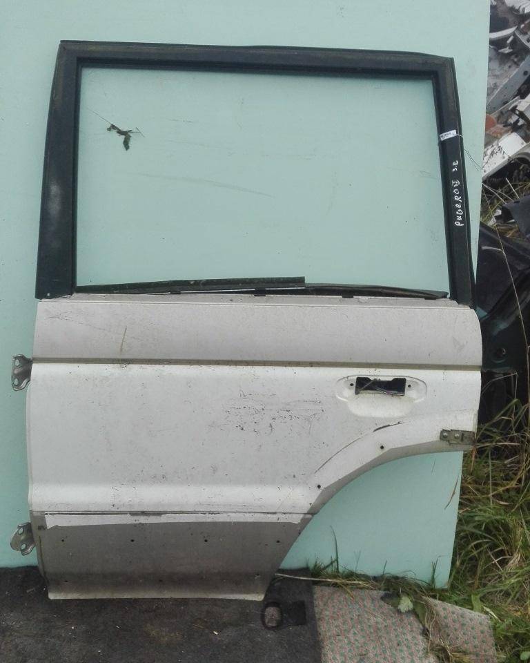 Стекло двери задней левой Mitsubishi Pajero 2 купить в Беларуси