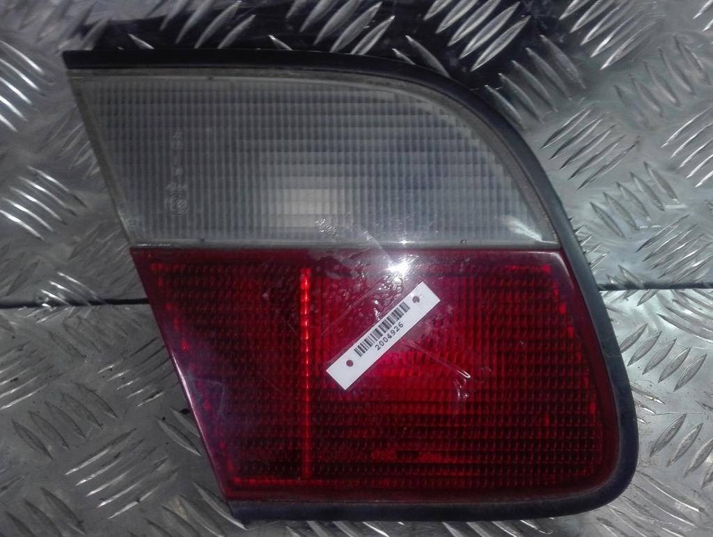 Фонарь крышки багажника левый Nissan Almera N15 купить в России