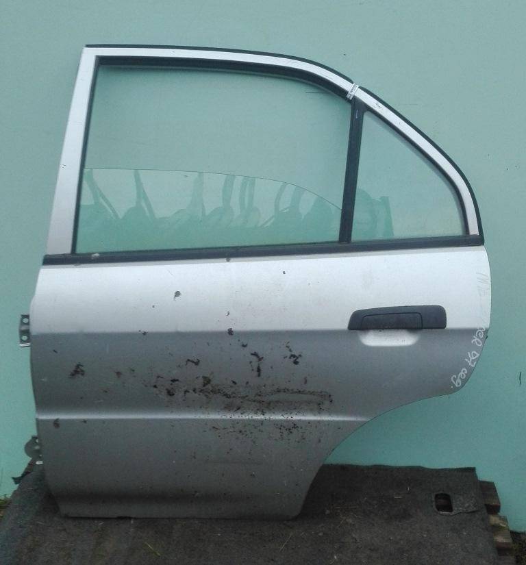 Дверь задняя левая Mitsubishi Lancer 6 купить в Беларуси